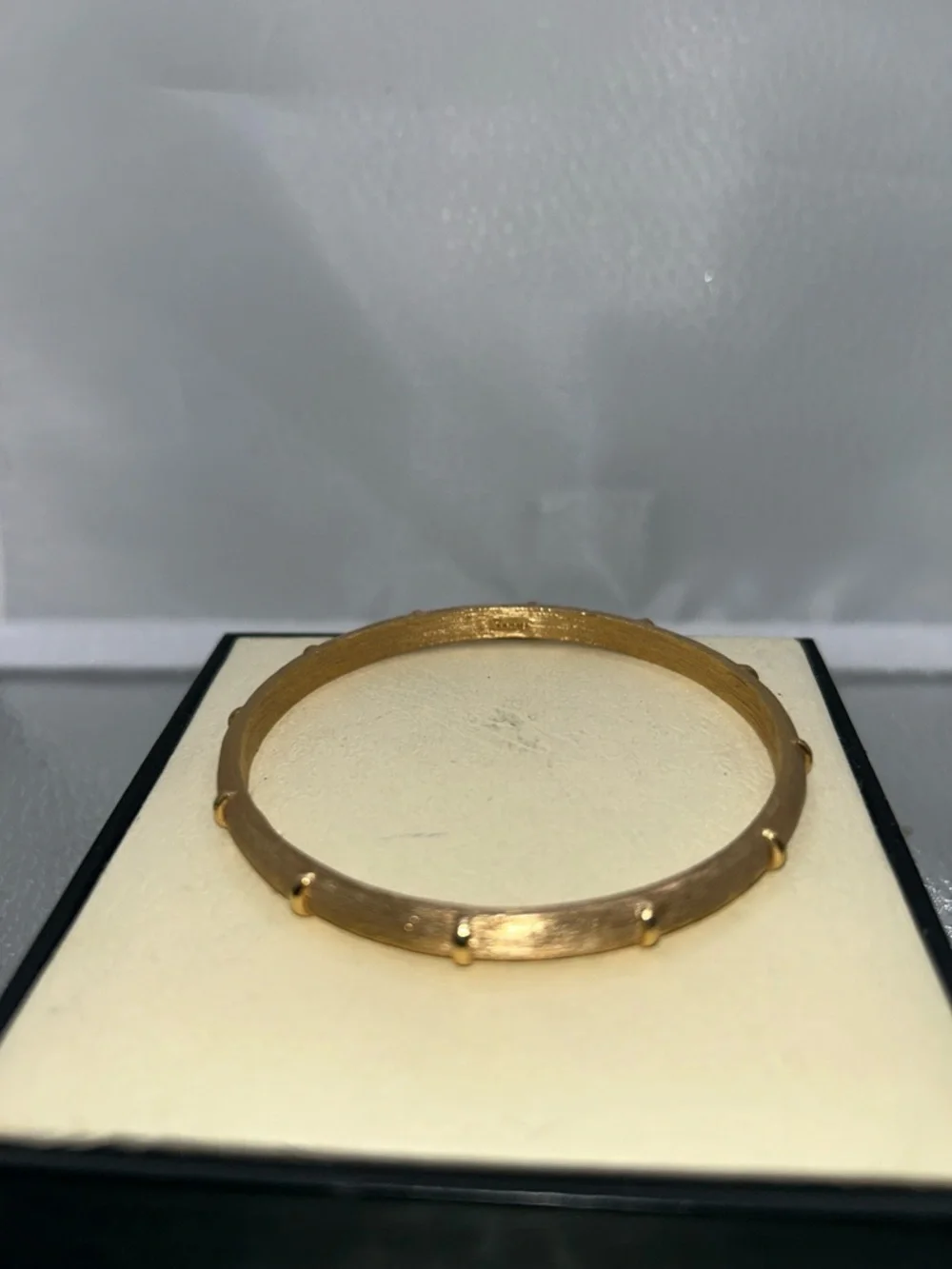 Vintage trifari bangle sleek gold tone brushed texture raised accents classic